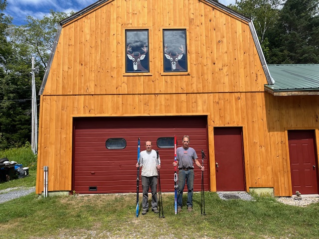 Mike and Steve doing their best American Gothic impersonation with skis and poles