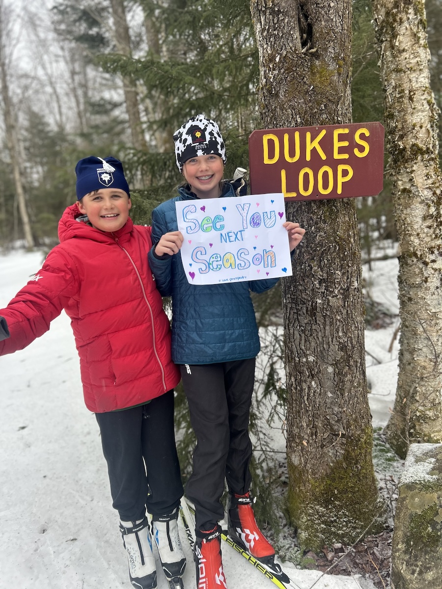 Kids holding see you next season sign